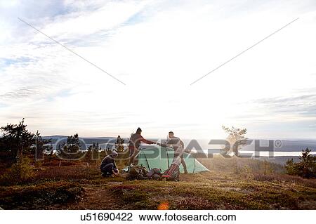 Hikers setting up tent, Keimiotunturi, Lapland, Finland View Large Photo Image Stock Image - Hikers setting up tent, Keimiotunturi, Lapland, Finland. Fotosearch