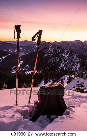 Hiking poles and backpack on top of snow covered Teufelstattkopf mountain, Oberammergau, Bavaria, Germany View Large Photo Image Stock Photo - Hiking poles and backpack on top of snow covered Teufelstattkopf mountain, Oberammergau, Bavaria, Germany. Fotosearch