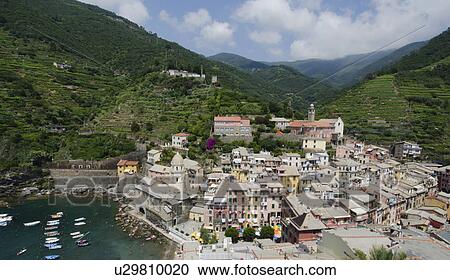 Italy, CinqueTerre, Vernazza, Landscape with town by sea View Large Photo Image Stock Image - Italy, CinqueTerre, Vernazza, Landscape with town by sea. Fotosearch