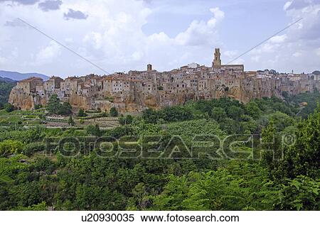 Stock Photography - Italy, Tuscany, Pitigliano, Landscape with old town. Fotosearch
