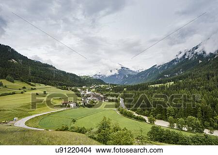 Landscape view with green valley and mountains, Surava, Switzerland View Large Photo Image Picture - Landscape view with green valley and mountains, Surava, Switzerland. Fotosearch