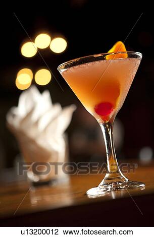 Stock Image - Martini cocktail in glass. Fotosearch