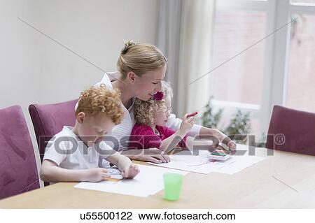 Mother drawing with son (8-9) and daughter (4-5) View Large Photo Image Stock Image - Mother drawing with son (8-9) and daughter (4-5). Fotosearch
