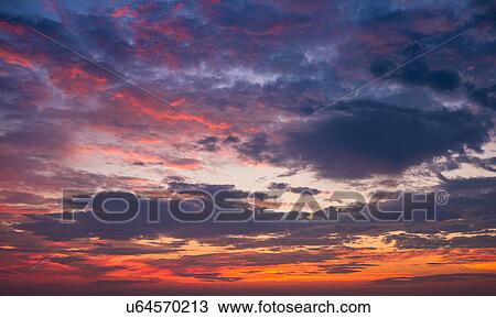 Stock Image - Multi colored dramatic sky. Fotosearch