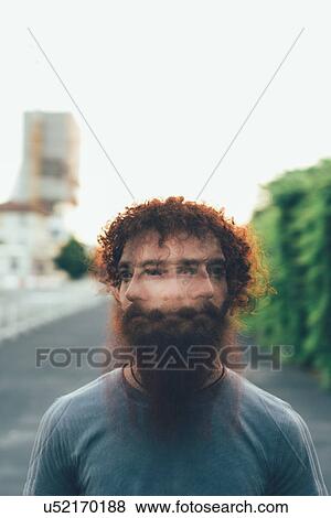Stock Photo - Multiple exposure portrait of young male hipster shaking head. Fotosearch