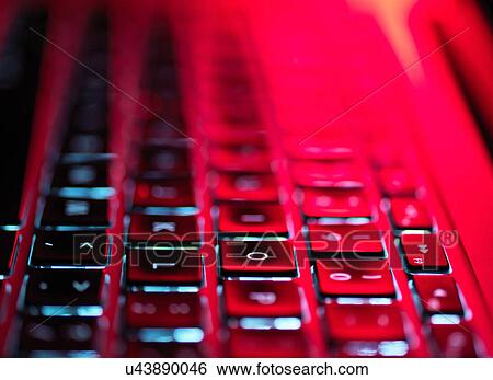 Night-lit laptop computer focusing on the keyboard View Large Photo Image Stock Photograph - Night-lit laptop computer focusing on the keyboard. Fotosearch
