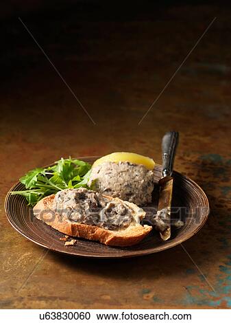 Oven roasted wild mushroom pate on crusty bread and rocket View Large Photo Image Stock Image - Oven roasted wild mushroom pate on crusty bread and rocket. Fotosearch
