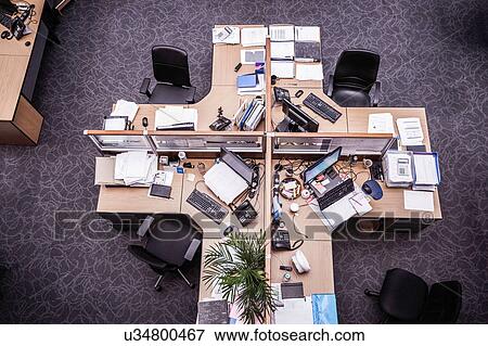 Overhead view of cross shaped office desk with desktop computers View Large Photo Image Stock Photo - Overhead view of cross shaped office desk with desktop computers. Fotosearch