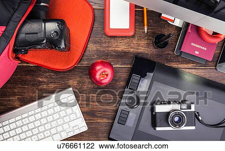 Overhead view of photo editing equipment; graphic tablet, retro camera, digital camera and computer keyboard View Large Photo Image Stock Image - Overhead view of photo editing equipment; graphic tablet, retro camera, digital camera and computer keyboard. Fotosearch
