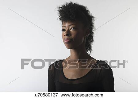 Pensive young woman View Large Photo Image Stock Photo - Pensive young woman. Fotosearch