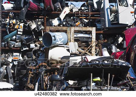 Pile of junk in junkyard View Large Photo Image Stock Image - Pile of junk in junkyard. Fotosearch