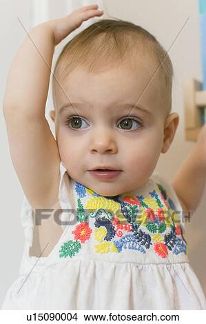 Picture - Portrait of baby girl (18-23 months). Fotosearch