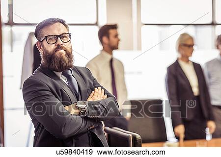 Portrait of bearded businessman in boardroom View Large Photo Image Stock Photo - Portrait of bearded businessman in boardroom. Fotosearch