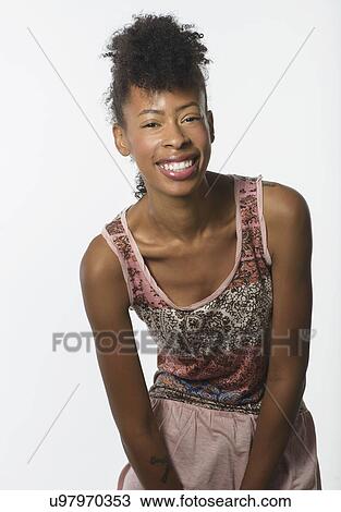 Portrait of fashion model in sleeveless tunic View Large Photo Image Stock Image - Portrait of fashion model in sleeveless tunic. Fotosearch