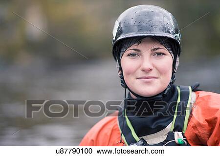 Portrait of young female kayaker in watersports helmet View Large Photo Image Stock Image - Portrait of young female kayaker in watersports helmet. Fotosearch