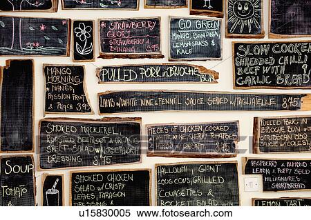 Quirky coffee shop interior with menu on chalked blackboards View Large Photo Image Stock Photography - Quirky coffee shop interior with menu on chalked blackboards. Fotosearch