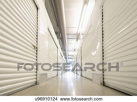 Picture - Row of self storage units. Fotosearch