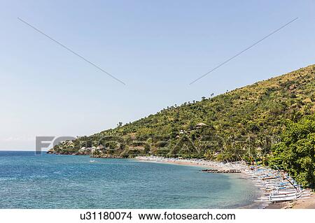 Rows of boats on beach, Amed, Bali, Indonesia View Large Photo Image Picture - Rows of boats on beach, Amed, Bali, Indonesia. Fotosearch