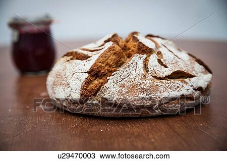 Rye bread (Roggenbrot) and jam on wooden table View Large Photo Image Stock Image - Rye bread (Roggenbrot) and jam on wooden table. Fotosearch