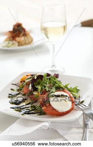 Stock Photograph - Salad on white plate. Fotosearch