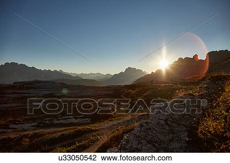 Scenic mountain landscape at sunset, Dolomites, Sexten, South Tyrol, Italy View Large Photo Image Stock Image - Scenic mountain landscape at sunset, Dolomites, Sexten, South Tyrol, Italy. Fotosearch