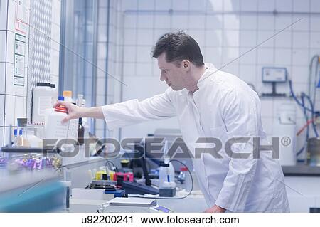 Scientist working in laboratory View Large Photo Image Stock Image - Scientist working in laboratory. Fotosearch