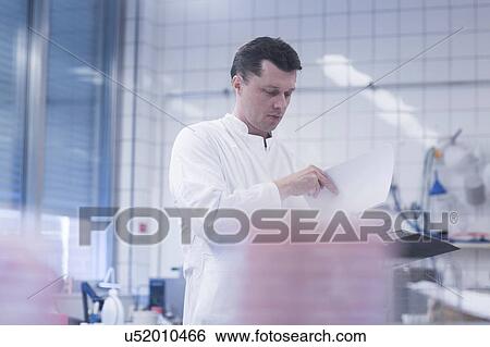 Scientist working in laboratory View Large Photo Image Stock Photograph - Scientist working in laboratory. Fotosearch
