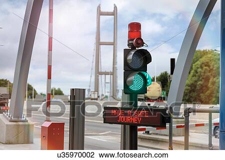 Stock Image - Signals at toll booth at bridge toll. Fotosearch