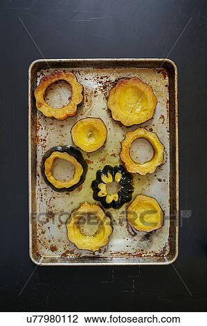 Stock Image - Small baked pumpkins. Fotosearch