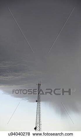 Storm clouds gathering above communications tower View Large Photo Image Stock Photo - Storm clouds gathering above communications tower. Fotosearch