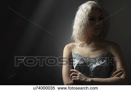 Studio portrait of young woman with white hair View Large Photo Image Stock Photography - Studio portrait of young woman with white hair. Fotosearch