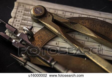 Studio shot of antique instruments of measurement View Large Photo Image Stock Image - Studio shot of antique instruments of measurement. Fotosearch