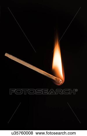 Stock Photo - Studio shot of burning match. Fotosearch