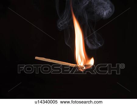 Stock Photography - Studio shot of burning match. Fotosearch