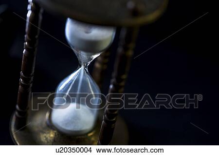 Picture - Studio shot of hourglass. Fotosearch