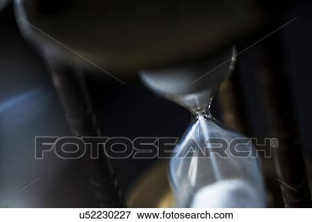 Studio shot of hourglass View Large Photo Image Stock Photo - Studio shot of hourglass. Fotosearch