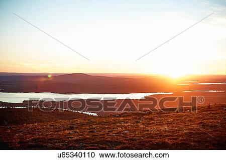 Sunset over lake, Keimiotunturi, Lapland, Finland View Large Photo Image Stock Image - Sunset over lake, Keimiotunturi, Lapland, Finland. Fotosearch