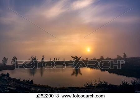 Stock Image - Sunset over lake, Sarkitunturi, Lapland, Finland. Fotosearch
