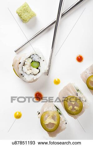 Sushi and metal chopsticks View Large Photo Image Stock Image - Sushi and metal chopsticks. Fotosearch