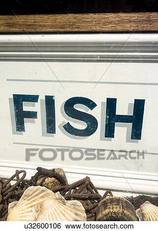 The word fish on shop sign, Southwold, Suffolk, UK View Large Photo Image Stock Photograph - The word fish on shop sign, Southwold, Suffolk, UK. Fotosearch