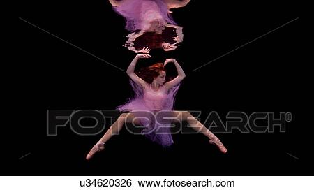 Stock Photograph - Underwater view of girl wearing tutu and ballet shoes. Fotosearch
