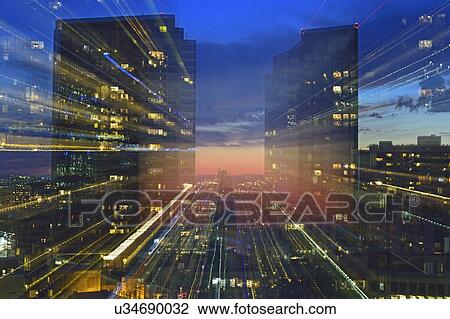 Stock Image - USA, Boston, Massachusetts, Office buildings at dusk. Fotosearch