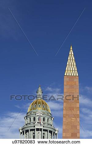 USA, Colorado, Denver, Capitol State building and Veterans monument against blue sky View Large Photo Image Stock Image - USA, Colorado, Denver, Capitol State building and Veterans monument against blue sky. Fotosearch