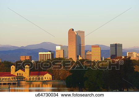 Picture - USA, Colorado, Denver, City Park with buildings in background at dawn. Fotosearch