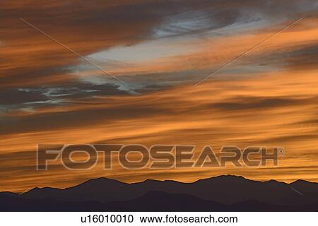 Stock Image - USA, Colorado, Denver, Sky over Front Range at dusk. Fotosearch