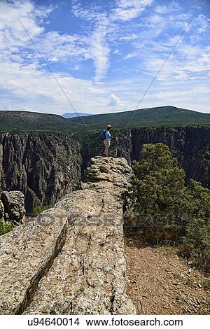 USA, Colorado, Gunnison, Hiker in Black Canyon of the Gunnison View Large Photo Image Picture - USA, Colorado, Gunnison, Hiker in Black Canyon of the Gunnison. Fotosearch