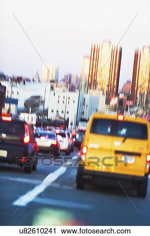 Stock Image - USA, New Jersey, Jersey City, Traffic in city street. Fotosearch