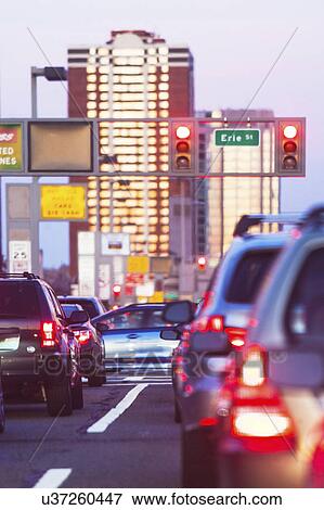 Stock Photo - USA, New Jersey, Jersey City, Traffic in city street. Fotosearch