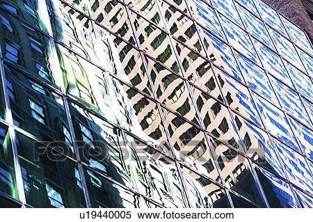 USA, New York City, Glass facade of office building View Large Photo Image Stock Photography - USA, New York City, Glass facade of office building. Fotosearch