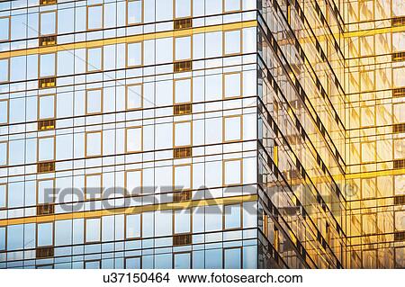 Picture - USA, New York, New York City, Glass facade of office building. Fotosearch